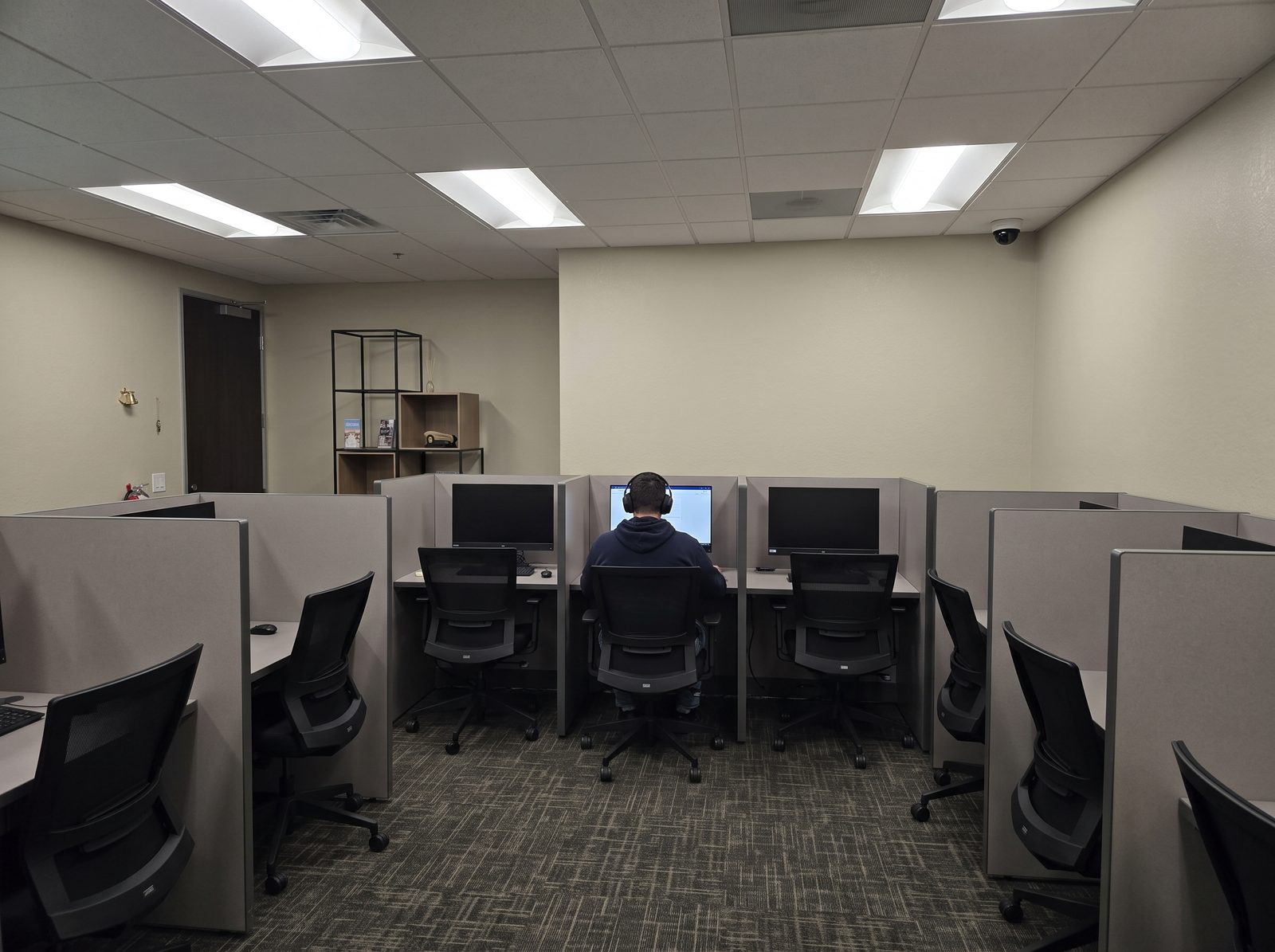 Candidate taking a certification exam at a Pearson VUE testing station in San Diego